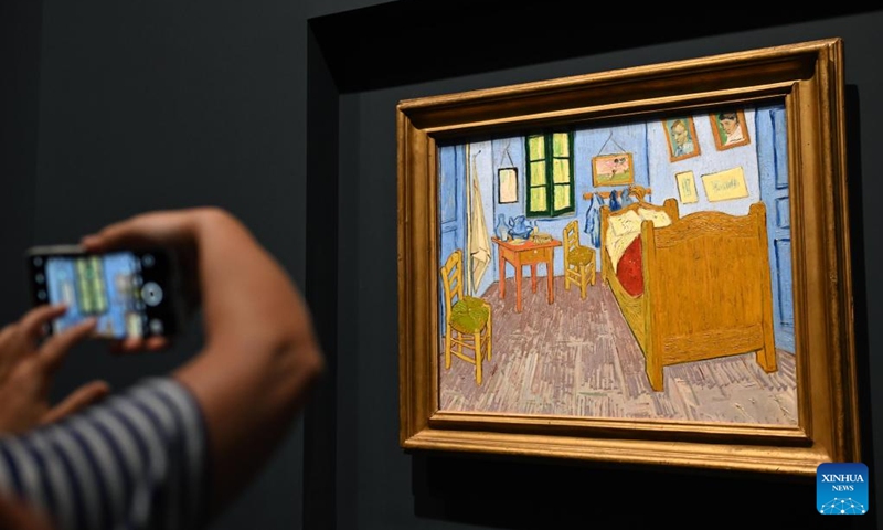 A visitor takes photos of a masterpiece of Vincent van Gogh during the exhibition of Paths to Modernity: Masterpieces from the Musee d'Orsay, Paris at the Museum of Art Pudong in east China's Shanghai, Aug. 20, 2025. Opened here on June 19, the exhibition gathers over 100 masterpieces from the 1840s to the early 20th century, encompassing nearly all major artistic movements represented in the Musee d'Orsay's collections. Photo: Xinhua