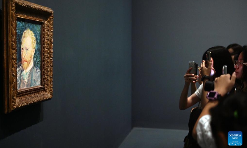 Visitors observe a masterpiece of Vincent van Gogh during the exhibition of Paths to Modernity: Masterpieces from the Musee d'Orsay, Paris at the Museum of Art Pudong in east China's Shanghai, Aug. 20, 2025. Opened here on June 19, the exhibition gathers over 100 masterpieces from the 1840s to the early 20th century, encompassing nearly all major artistic movements represented in the Musee d'Orsay's collections. Photo: Xinhua