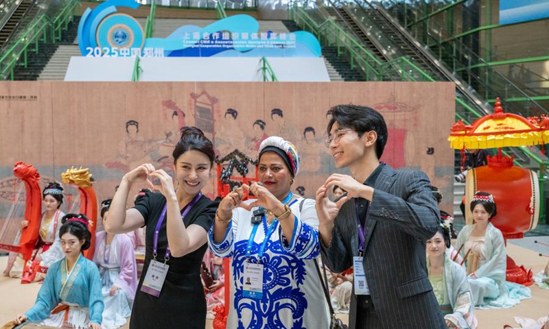 A representative interacts with the media at the site of the Shanghai Cooperation Organization (SCO) Media and Think Tank Summit in Zhengzhou, capital of central China's Henan Province, July 25, 2025. Photo: Xinhua