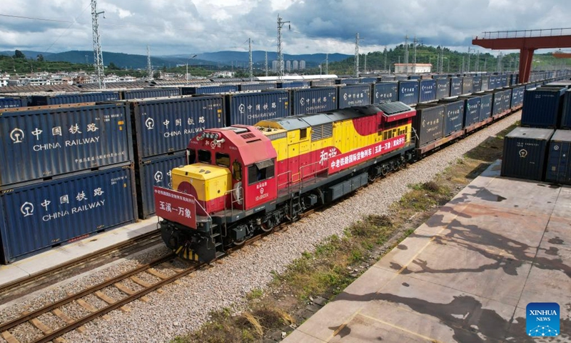 An aerial drone photo taken on Aug. 23, 2025 shows an international freight train, which departed from Lao capital Vientiane, at An aerial drone photo taken on Aug. 23, 2025 shows an international freight train, which departed from Lao capital Vientiane, at Yanhe Station of China-Laos Railway in Yuxi City, southwest China's Yunnan Province. (Xinhua/Chen Xinbo)