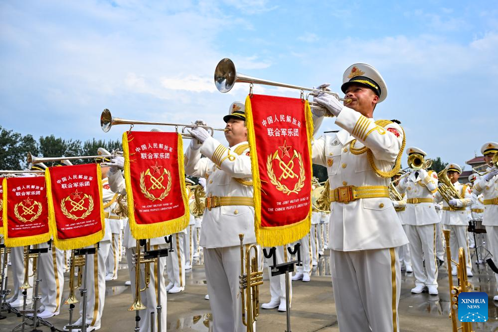 Members of the joint military band of the Chinese People's Liberation Army take part in a training for the upcoming V-Day military parade in Beijing, capital of China, Aug. 12, 2025. Participants are busy preparing for the upcoming V-Day military parade scheduled on Sept. 3 in Tian'anmen Square to mark the 80th anniversary of the victory in the Chinese People's War of Resistance Against Japanese Aggression and the World Anti-Fascist War. (Xinhua/Zhang Cheng)