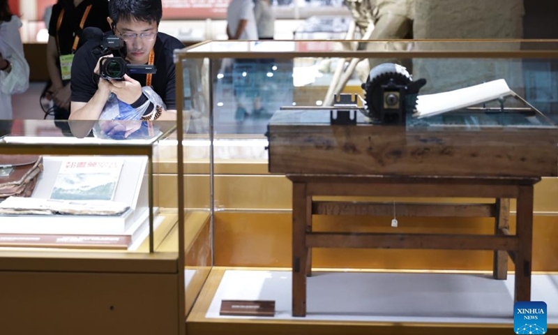A journalist shoots videos during the visit to the Museum of the War of Chinese People's Resistance Against Japanese Aggression in Beijing, capital of China, Aug. 27, 2025. Nearly 200 journalists went to the Museum of the War of Chinese People's Resistance Against Japanese Aggression for visits and interviews on Wednesday.