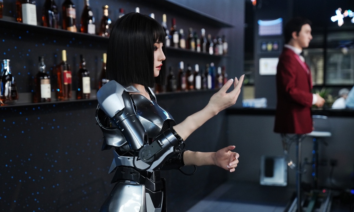 A humanoid service robot is seen at the front desk of a restaurant inside the world's first humanoid robot 4S store, Robot Mall, in Yizhuang, Beijing on August 4, 2025. Photo: VCG