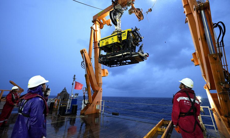 China's self-developed Haiqin, a 6,000-meter deep-sea remotely operated vehicle (ROV), is recovered from the sea, onboard ship Zhong Shan Da Xue, in the South China Sea, Aug. 23, 2025. (Xinhua)