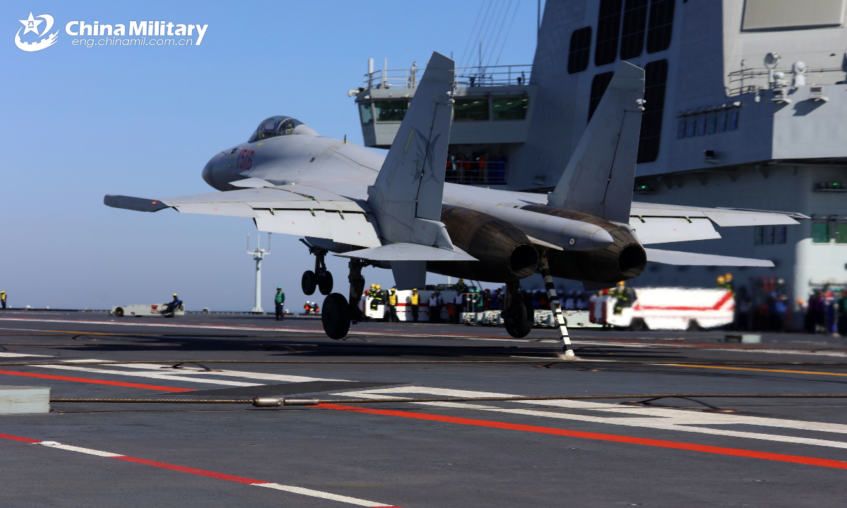 A J-15T heavy fighter jet lands on China's first electromagnetic catapult-equipped aircraft carrier, the Fujian (Hull 18). Three types of aircraft recently completed their inaugural electromagnetic catapult-assisted takeoff and arrested landing trainings on the aircraft carrier.(eng.chinamil.com.cn/Photo by Ju Zhenhua)