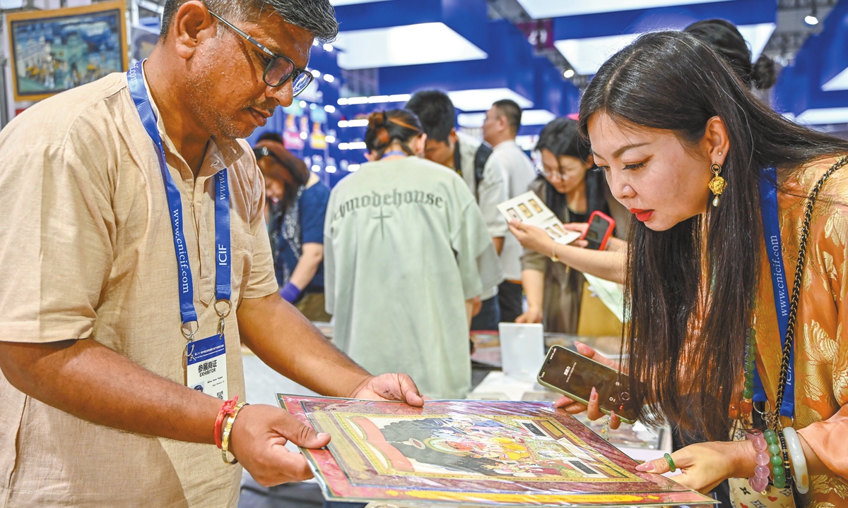 Paintings at the Indian booth at the 21st China (Shenzhen) International Cultural Industries Fair attract visitors on May 22, 2025. Photo: IC