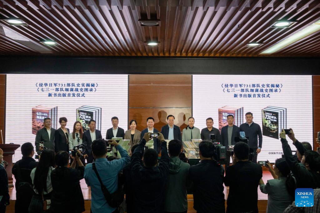 The launch ceremony for two new books on the crimes of Unit 731 is held at the Exhibition Hall of Evidence of Crimes Committed by Unit 731 of the Japanese Imperial Army, in Harbin, northeast China's Heilongjiang Province, Sept. 17, 2025. The two books, with the latest research covering transnational verification, oral histories, and multilingual archives, record the crimes of Unit 731 and expose Japan's wartime atrocities. (Xinhua/Zhang Tao)