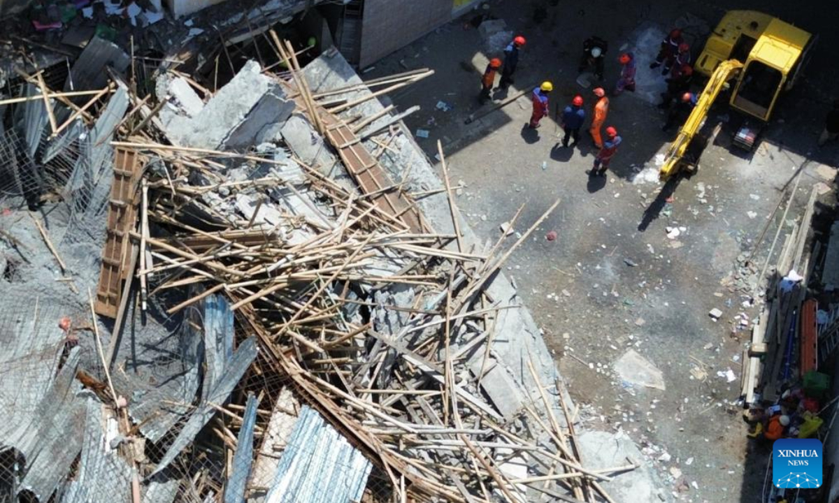 An aerial drone photo shows rescuers near the site of a collapsed school building at Al Khoziny Islamic Boarding School in Sidoarjo district, East Java, Indonesia, Oct. 1, 2025. Indonesia's disaster management agency said Wednesday that at least 91 were trapped after a school building collapsed on Monday in the Sidoarjo district of East Java province. (Photo by Sahlan Kurniawan/Xinhua)