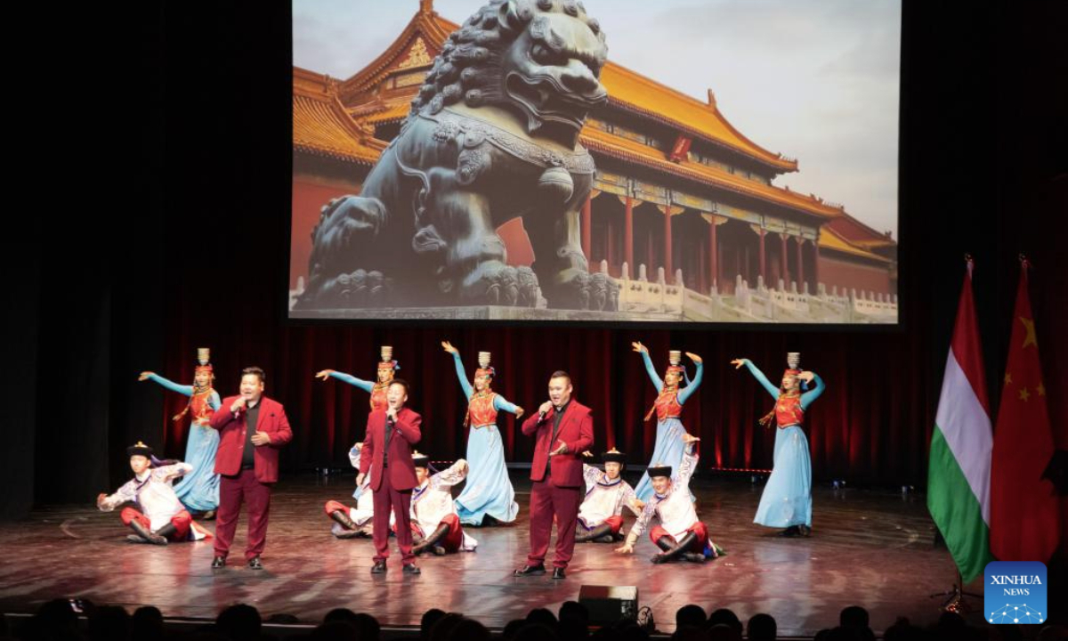 A joint performance by the Ulan Muqir art troupe from China's Inner Mongolia Autonomous Region and the Hungarian National Folk Dance Ensemble is staged during a reception to mark the 76th anniversary of the founding of the People's Republic of China and the 76th anniversary of diplomatic ties between China and Hungary in Budapest, Hungary, Sept. 16, 2025. (Photo by Attila Volgyi/Xinhua)