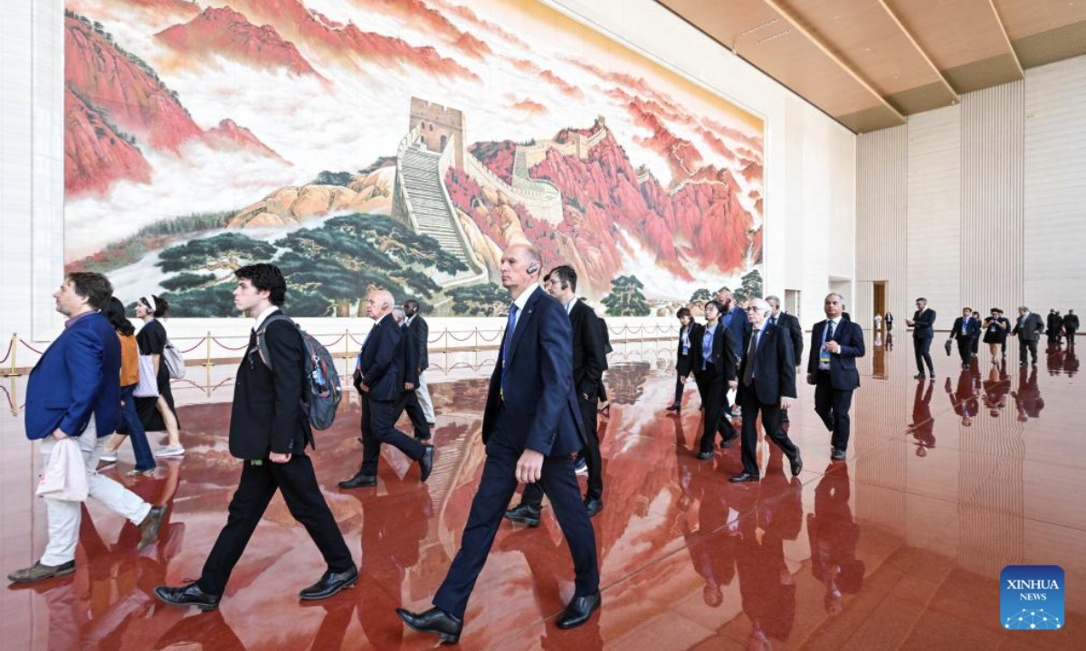 Delegates visit the Museum of the Communist Party of China in Beijing, capital of China, Sept. 26, 2025. Delegates to the Peace Conference in Commemoration of the 80th Anniversary of the Victory of the Chinese People's War of Resistance Against Japanese Aggression and the World Anti-Fascist War visited the Museum of the Communist Party of China and the Museum of the War of Chinese People's Resistance Against Japanese Aggression here on Friday. They also attended the Peace Gathering in Commemoration of the 80th Anniversary of the Victory of the Chinese People's War of Resistance Against Japanese Aggression and the World Anti-Fascist War on Friday. (Xinhua/Chen Yehua)