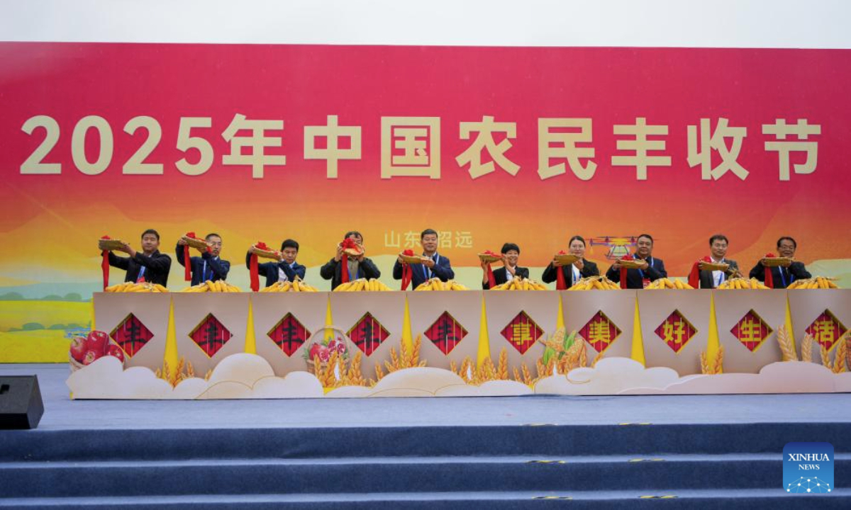 Farmer representatives from across China jointly participate an event celebrating the eighth Chinese farmers' harvest festival in Zhaoyuan City, east China's Shandong Province, Sept. 23, 2025. The Chinese farmers' harvest festival is the first national festival created specifically for the country's farmers. Starting in 2018, the festival coincides with the Autumnal Equinox each year, which is one of the 24 solar terms of the Chinese lunisolar calendar and usually falls between Sept. 22 and 24 during the country's agricultural harvest season. (Xinhua/Xu Suhui)