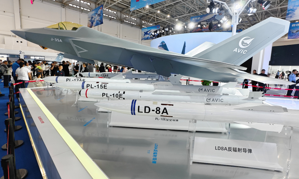 A scale model of the J-35A stealth fighter jet is on display together with several types of missiles at the booth of the Aviation Industry Corporation of China during the Air Force Open-day Activities and Changchun Air Show in Changchun, Northeast China's Jilin Province on September 20, 2025. Photo: Liu Xuanzun/GT