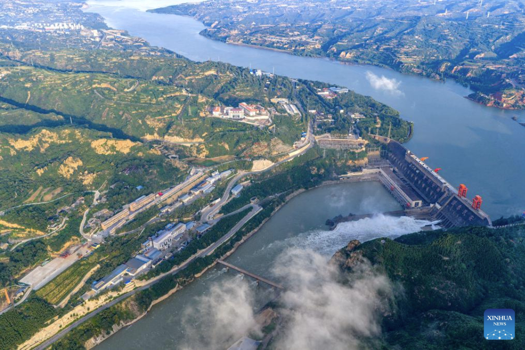 An aerial drone photo taken on July 4, 2025 shows a view of the Sanmenxia Reservoir on the Yellow River in central China's Henan Province. (Photo by Du Jie/Xinhua)