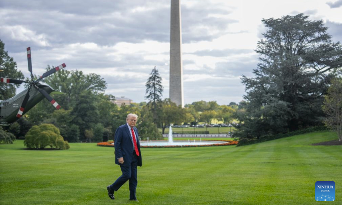 U.S. President Donald Trump walks on the South Lawn upon arrival at the White House in Washington, D.C., the United States, on Oct. 10, 2025. (Xinhua/Hu Yousong)