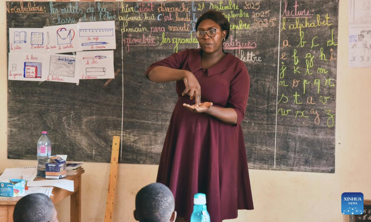 A teacher gives a lesson on sign language at a special school for hearing-impaired children in Yaounde, Cameroon, Sept. 22, 2025.

The International Day of Sign Languages is observed annually on Sept. 23. (Xinhua/Kepseu)