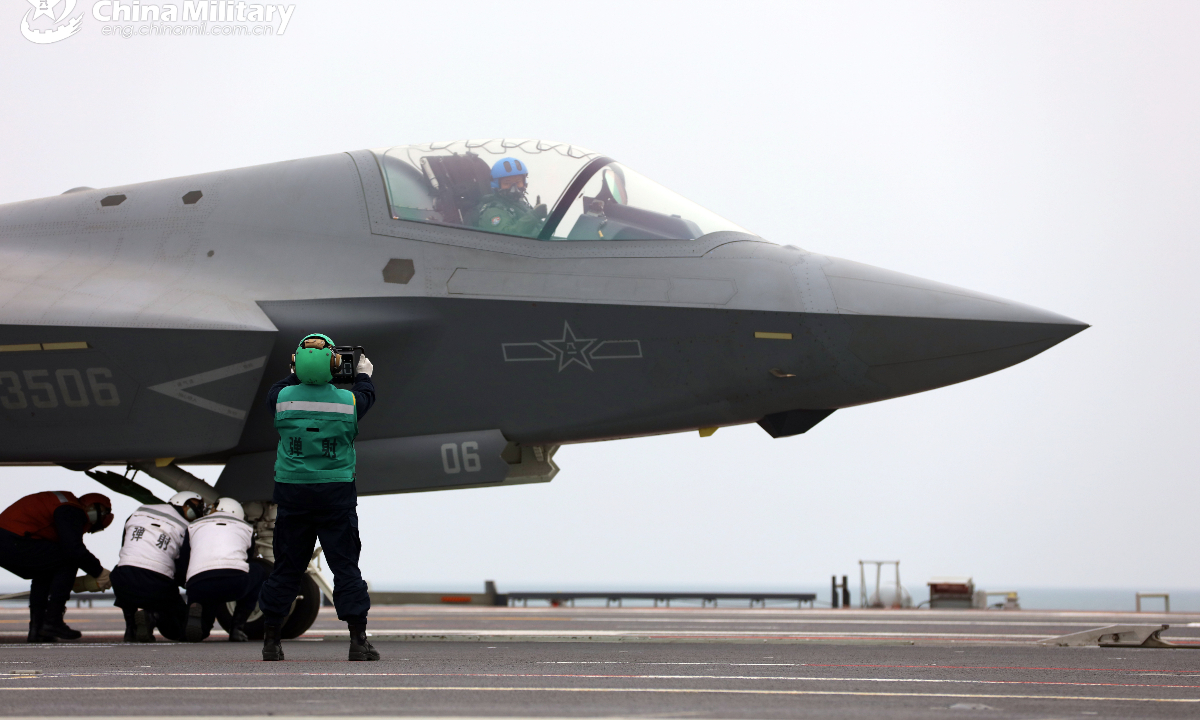 A J-35 stealth fighter jet is ready to take off from China's first electromagnetic catapult-equipped aircraft carrier, the <em>Fujian</em> (Hull 18). Three types of aircraft recently completed their inaugural electromagnetic catapult-assisted takeoff and arrested landing trainings on the aircraft carrier.(eng.chinamil.com.cn/Photo by Ju Zhenhua)