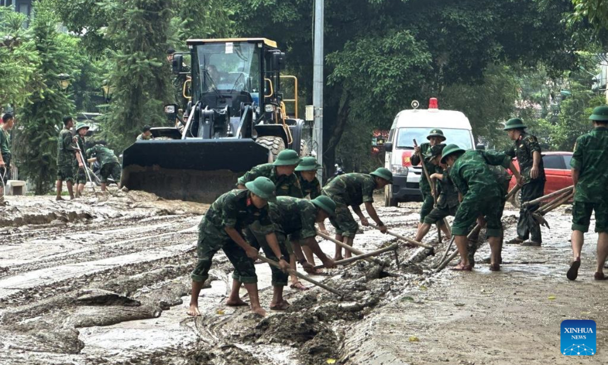 People do cleanup work in Tuyen Quang province, Vietnam, Oct. 3, 2025. Typhoon Bualoi and ensuing floods and landslides have killed 51 people, left 14 others missing and injured 164 across northern and central Vietnam, with preliminary economic losses estimated at nearly 15.9 trillion Vietnamese dong (about 608 million U.S. dollars), the Vietnam Disaster and Dyke Management Authority said in a report on Friday. (VNA via Xinhua)