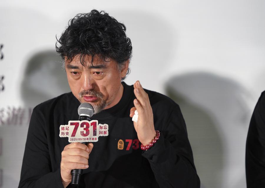 Zhao Linshan, director of the film Evil Unbound, communicates with the audience after watching the film in Harbin, northeast China's Heilongjiang Province, Sept. 17, 2025. (Xinhua/Wang Song)