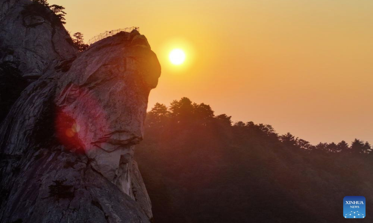 An aerial drone photo taken on Oct. 9, 2025 shows the scenery of Guifeng mountain at sunrise in Macheng City, central China's Hubei Province. (Xinhua/Chen Yehua)