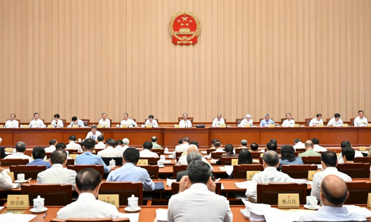 Zhao Leji, chairman of the National People's Congress (NPC) Standing Committee, attends the second plenary meeting of the 17th session of the 14th NPC Standing Committee at the Great Hall of the People in Beijing, capital of China, Sept. 10, 2025. (Xinhua/Yin Bogu)