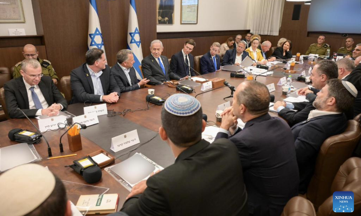 Israeli Prime Minister Benjamin Netanyahu (5th L, rear), U.S. Special Envoy to the Middle East Steve Witkoff (4th L, rear) and U.S. President Donald Trump's son-in-law Jared Kushner (6th L, rear) attend a government meeting in Jerusalem on Oct. 9, 2025. The Israeli government on early Friday approved a ceasefire deal with Hamas to end the war in Gaza and secure the release of all remaining hostages. (Ma'ayan Toaf/GPO/Handout via Xinhua)