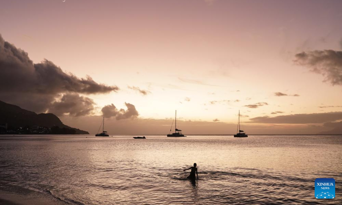 This photo taken on Sept. 24, 2025 shows a sunset view on Mahe Island, Seychelles. Seychelles is an Indian Ocean archipelago comprising 115 islands. Mahe Island, the largest among all islands of the nation, is home to the capital city Victoria and a renowned tourist destination. (Xinhua/Han Xu)