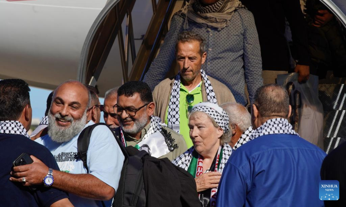 People welcome crew members of the Global Sumud Flotilla released from Israeli custody at Mitiga International Airport in Tripoli, Libya, on Oct. 8, 2025.

The Libyan vessel Omar Al Mukhtar departed from Tripoli on Sept. 21 to join the Global Sumud Flotilla bound for Gaza. En route, the vessel was intercepted by Israel, and the crew was detained. (Photo by Hazem Turkia/Xinhua)
