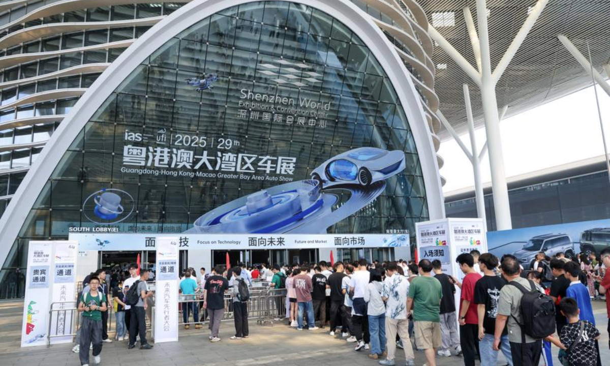 Visitors enter the Shenzhen World Exhibition and Convention Center for the 2025 Guangdong-Hong Kong-Macao Greater Bay Area International Auto Show in Shenzhen, south China's Guangdong Province, May 31, 2025. (Xinhua/Liang Xu)