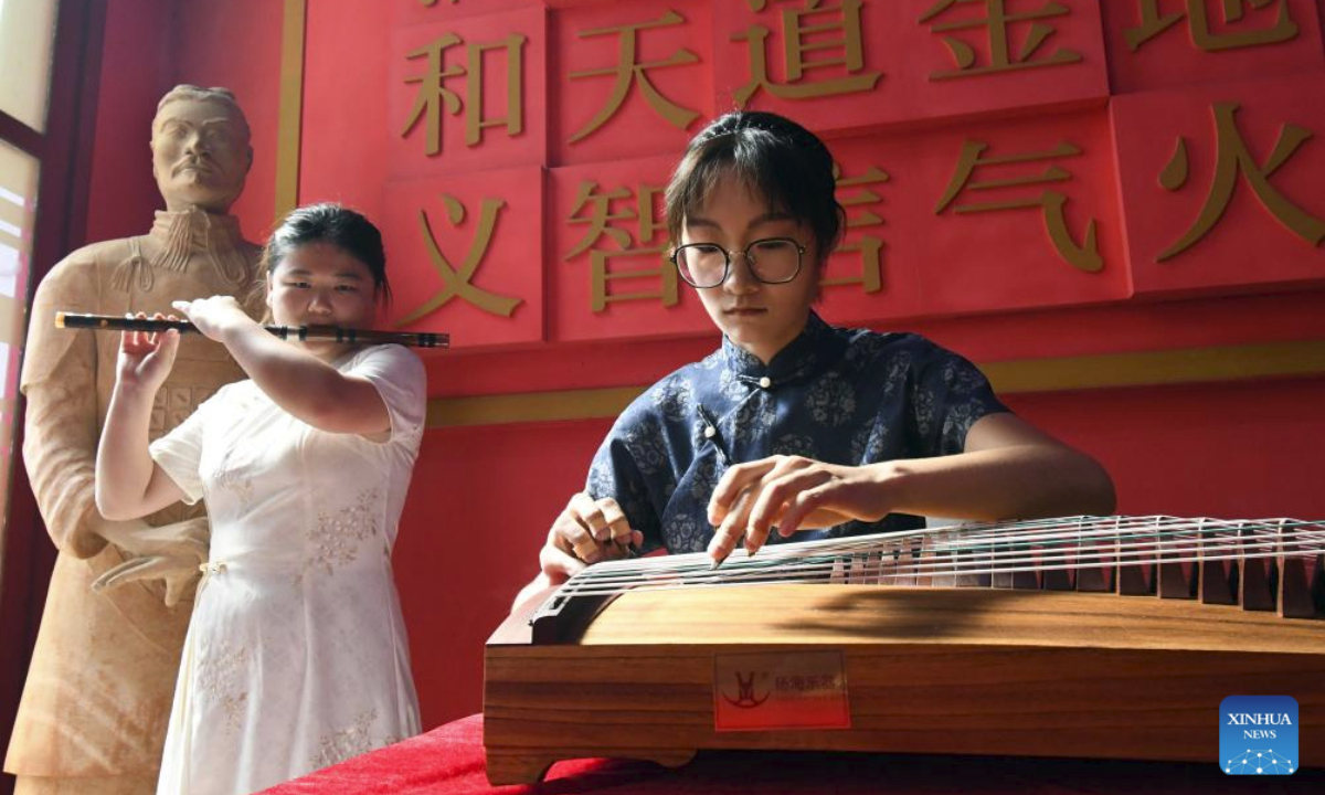 Two Chinese teachers from the Confucius Institute at the University of Havana perform during a cultural event Tea for Harmony: Yaji Cultural Salon in Havana, capital of Cuba, Sept. 30, 2025. (Photo by Joaquin Hernandez/Xinhua)