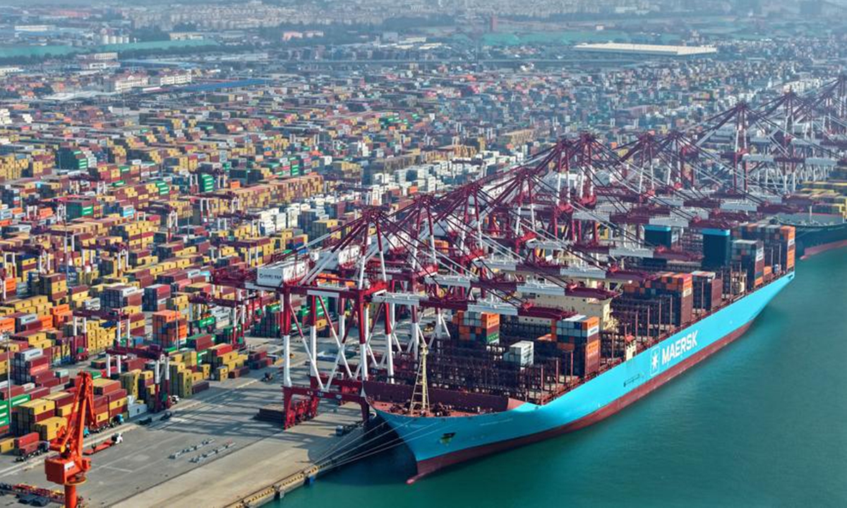 An aerial drone photo taken on Aug. 19, 2025 shows a cargo ship at Qingdao Port in Qingdao, east China's Shandong Province.  (Xinhua)