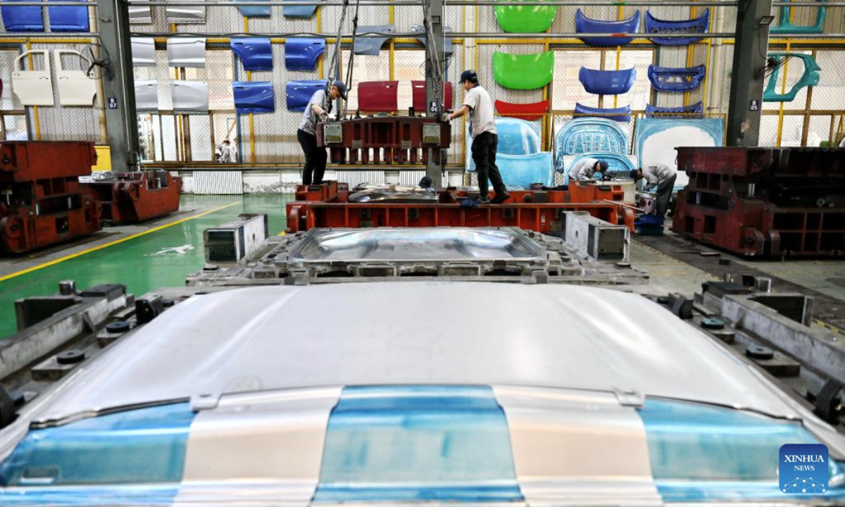 Workers assemble molds at a mold company in Botou, north China's Hebei Province, Sept. 24, 2025. In recent years, as one of the old industry bases in Hebei, Botou has witnessed its manufacturing processes converted to green and environmental friendly ones. At present, the city is home to over 300 casting companies, boasting an annual output of 26 billion yuan (about 3.65 billion U.S. dollars) by clustered players here. (Xinhua/Mu Yu)