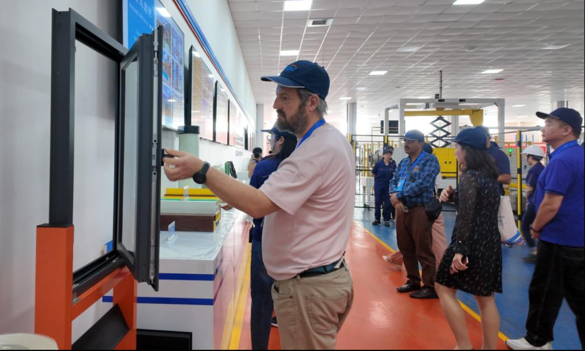 Faruk Boric, executive director of the Center for Promotion and Development of the Belt and Road Initiative in Bosnia and Herzegovina, visits the Chongqing Polycomp International Corporation in Chongqing on September 24, 2025. (Photo: People's Daily/Zhan Huilan)