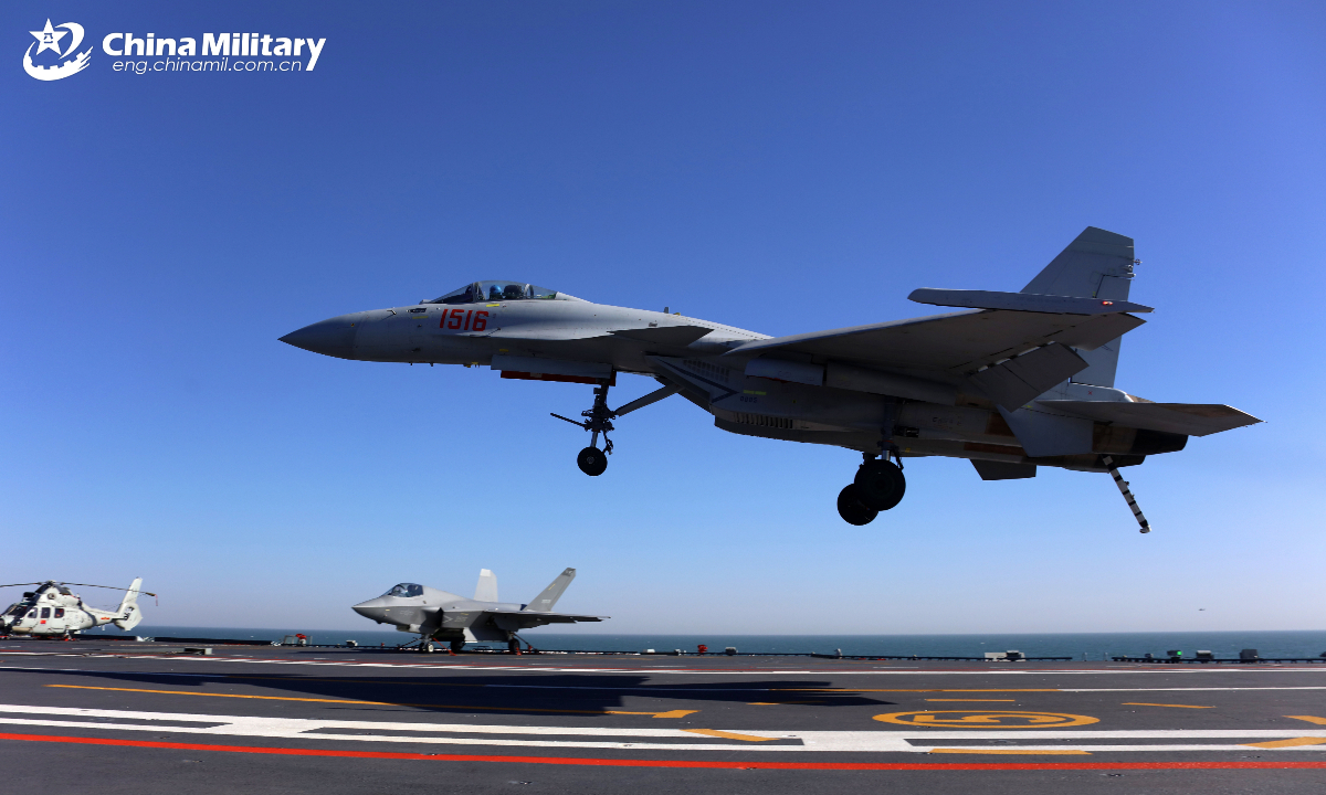 A J-15T heavy fighter jet lands on China's first electromagnetic catapult-equipped aircraft carrier, the Fujian (Hull 18). Three types of aircraft recently completed their inaugural electromagnetic catapult-assisted takeoff and arrested landing trainings on the aircraft carrier.(eng.chinamil.com.cn/Photo by Ju Zhenhua)