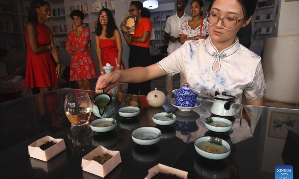 A Chinese teacher from the Confucius Institute at the University of Havana performs the tea ceremony during a cultural event Tea for Harmony: Yaji Cultural Salon in Havana, capital of Cuba, Sept. 30, 2025. (Photo by Joaquin Hernandez/Xinhua)