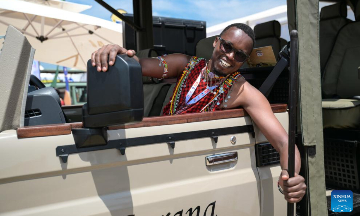 A Maasai man sits in an open-top safari vehicle at the 15th edition of the Magical Kenya Travel Expo in Nairobi, Kenya, Oct. 2, 2025. Kenya is hosting the three-day expo, running until Friday, which has attracted 6,500 delegates from 40 countries, including tourism ministers, city mayors, investors, travel enthusiasts, and promoters. (Xinhua/Yang Guang)