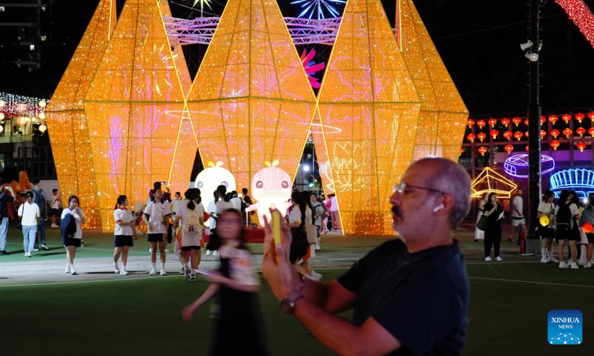 People visit a lantern fair marking the upcoming Mid-Autumn Festival and National Day at Victoria Park in Hong Kong, south China, Sep 30, 2025. Photo:Xinhua