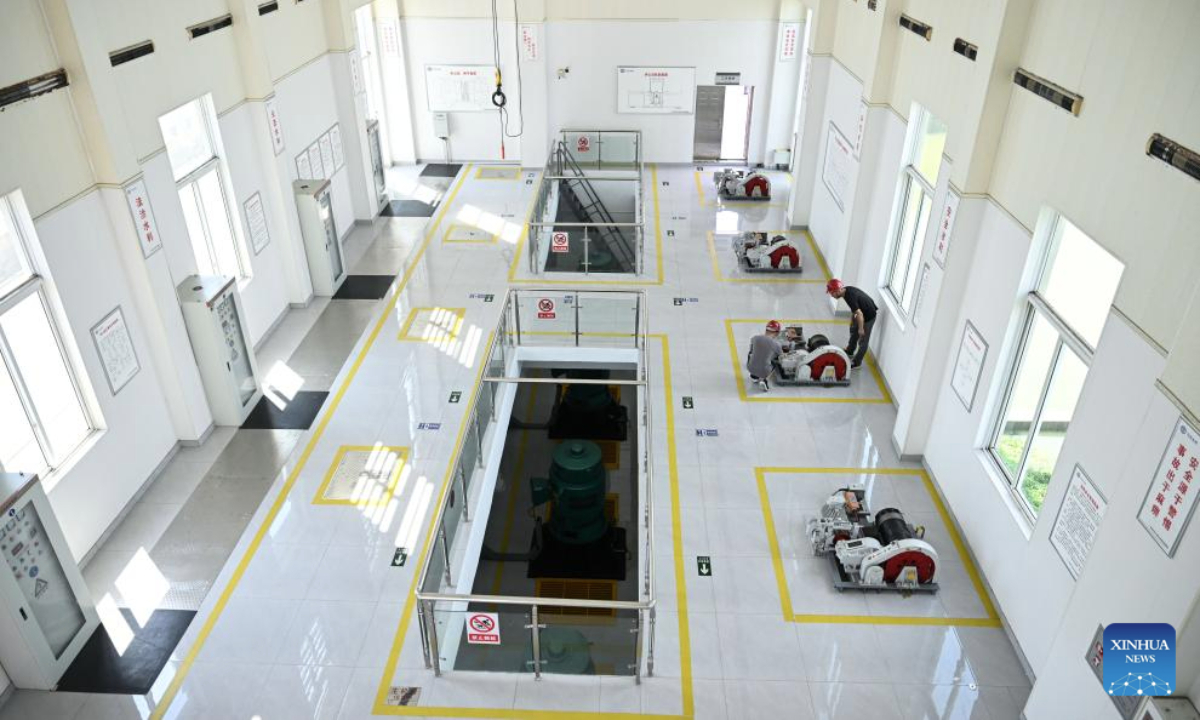 Staff members perform routine check up and maintenance at a pump house of Chishan sluice gate in Jurong City, east China's Jiangsu Province, on Sept. 15, 2025. The 17-century-old Chishan Lake Irrigation System has recently been added to the World Heritage Irrigation Structures (WHIS) list during the 76th International Executive Council Meeting of the International Commission on Irrigation & Drainage (ICID). The system is still nourishing more than 5,100 hectares of arable lands. (Xinhua/Ji Chunpeng)