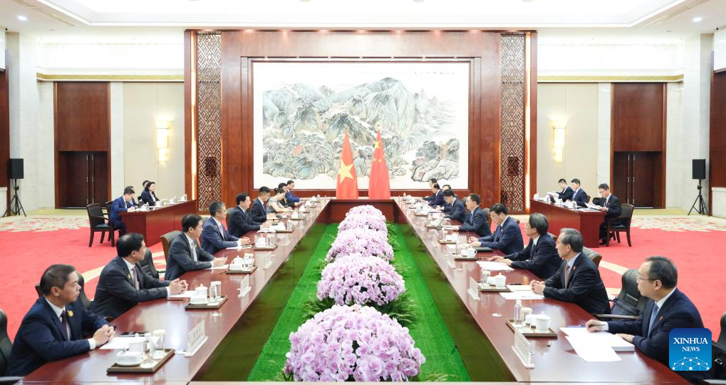 Chinese Vice President Han Zheng meets with Deputy Prime Minister of Vietnam Mai Van Chinh, who is in China to attend the 22nd China-ASEAN Expo and China-ASEAN Business and Investment Summit, in Nanning, south China's Guangxi Zhuang Autonomous Region, Sept. 16, 2025. (Xinhua/Ding Lin)