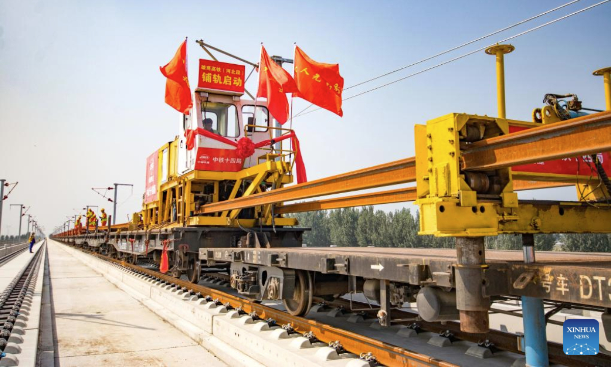 Workers operate at the track laying construction site of the Xiong'an-Shangqiu high-speed railway in Hejian city, north China's Hebei Province, Sept. 1, 2025. Track-laying operation officially kicked off on Monday throughout the Xiong'an-Shangqiu high-speed railway. With a designed speed of 350 km per hour, the 552-kilometer-long railway will connect Xiong'an in north China's Hebei Province and Shangqiu in central China's Henan Province after completion. (Photo by Yuan Ruiyu/Xinhua)