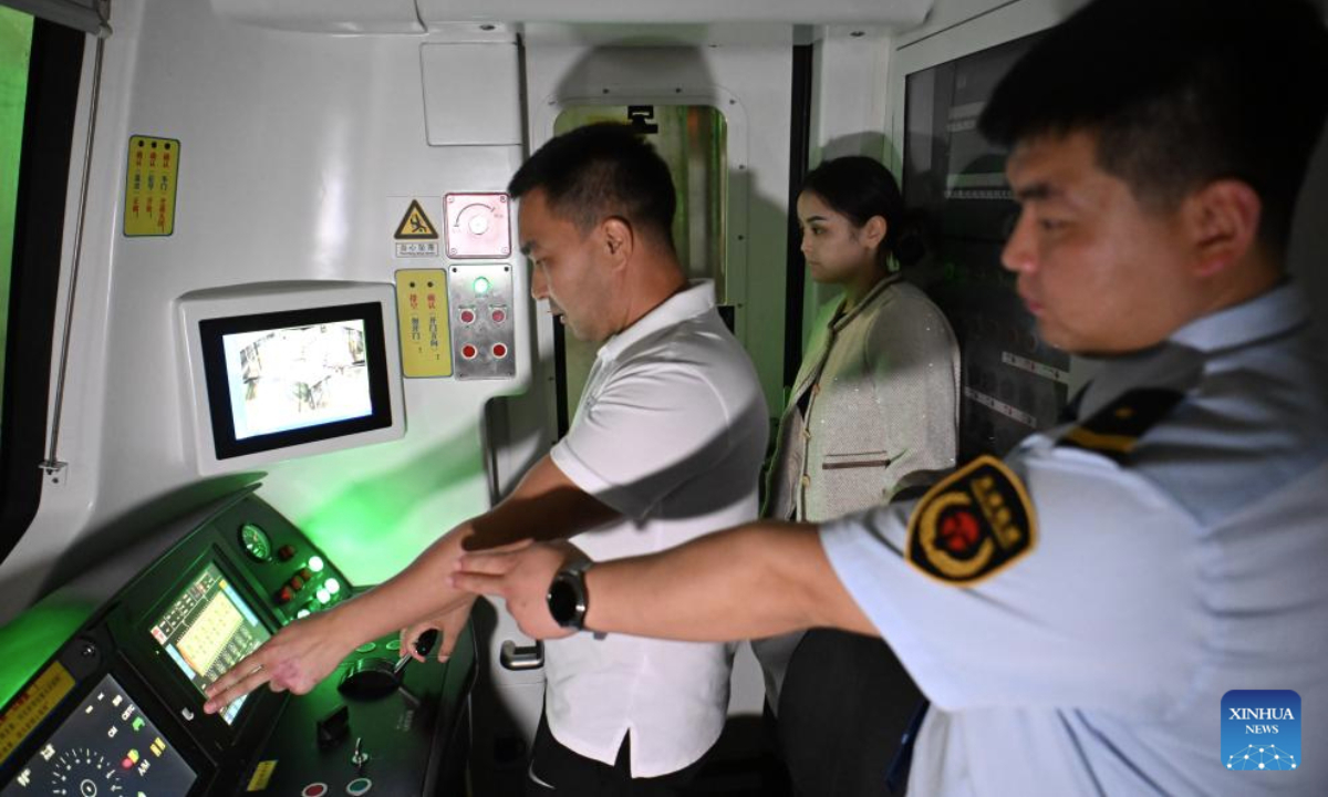 A Kazakh trainee (L) takes a test under the guidance of Zhang Yao (R), an instructor from Tianjin Rail Transit, during a light-rail driver training session in north China's Tianjin Municipality, Sept. 5, 2025. A batch of 29 drivers from Kazakhstan have recently qualified as light-rail drivers after finishing immersive training sessions in China's Tianjin.

Held by Tianjin Rail Transit, the three-month program provided customized technical solutions for driving on a light-rail line in Astana, capital of Kazakhstan. (Xinhua/Sun Fanyue)