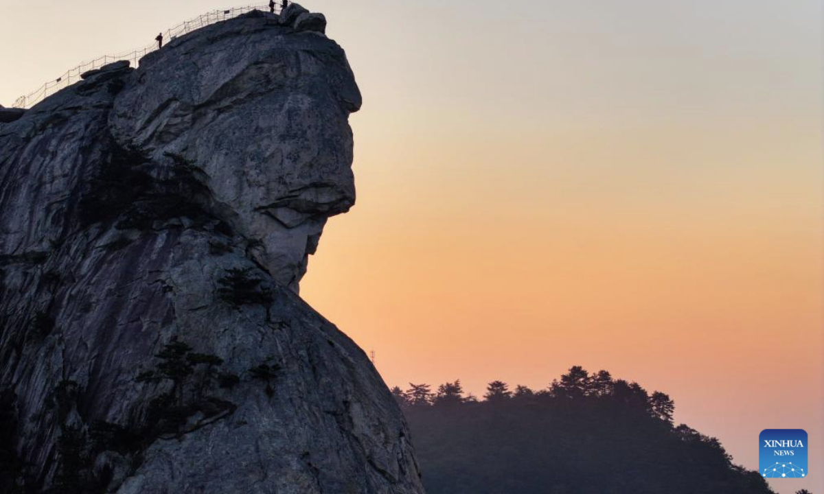 An aerial drone photo taken on Oct. 9, 2025 shows the scenery of Guifeng mountain at sunrise in Macheng City, central China's Hubei Province. (Xinhua/Chen Yehua)