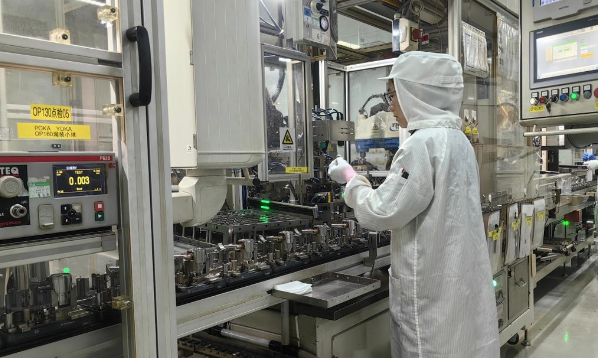 A staff member works at the production plant of the Marelli Powertrain (Hefei) Co., Ltd. in Hefei, east China's Anhui Province, Sept. 5, 2025. (Xinhua/Wang Haiyue)