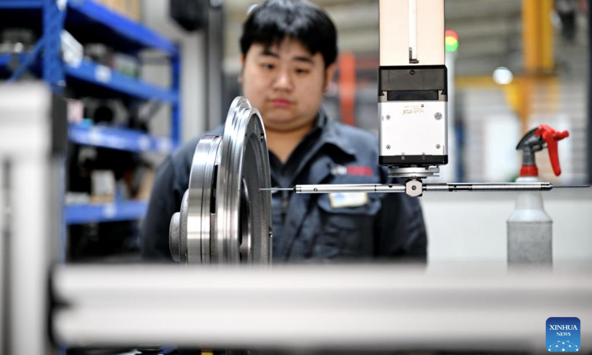 A worker checks product quality at a casting company in Botou, north China's Hebei Province, Sept. 24, 2025. In recent years, as one of the old industry bases in Hebei, Botou has witnessed its manufacturing processes converted to green and environmental friendly ones. At present, the city is home to over 300 casting companies, boasting an annual output of 26 billion yuan (about 3.65 billion U.S. dollars) by clustered players here. (Xinhua/Mu Yu)
