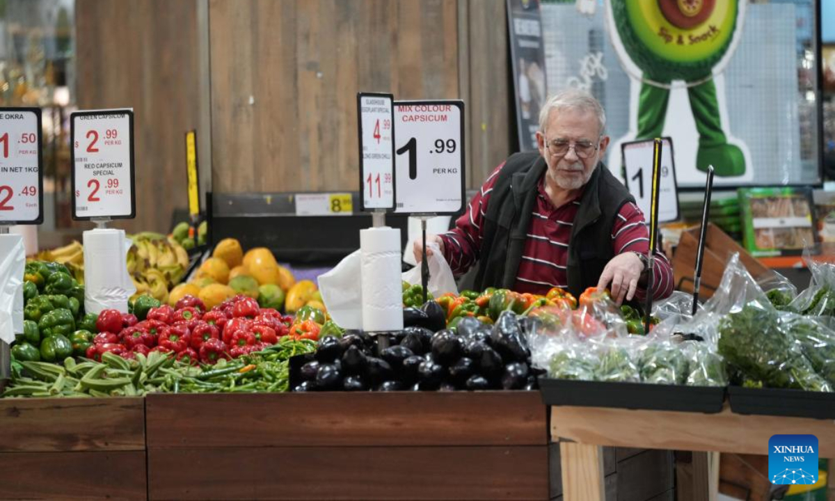 A customer selects vegetable at a shopping center in Canberra, Australia, Sept. 3, 2025. Australia's rate of economic growth accelerated to 0.6 percent in the second quarter of 2025, according to official figures released on Wednesday. (Photo by Zhang Na/Xinhua)