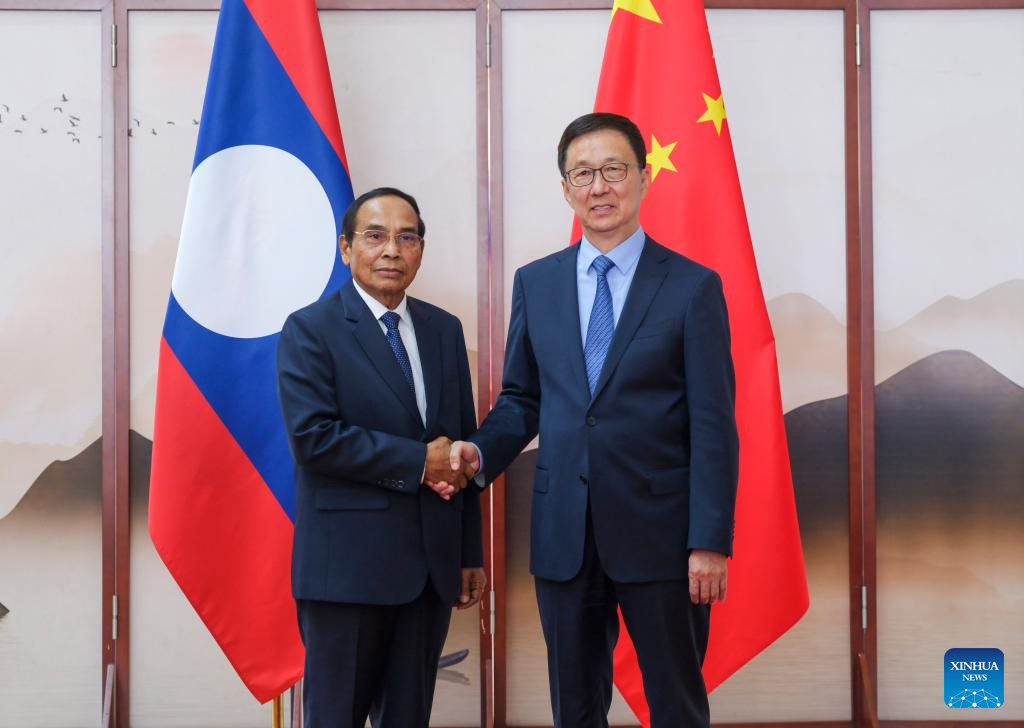 Chinese Vice President Han Zheng meets with Vice President of Laos Bounthong Chitmany, who is in China to attend the 22nd China-ASEAN Expo and China-ASEAN Business and Investment Summit, in Nanning, south China's Guangxi Zhuang Autonomous Region, Sept. 16, 2025. (Xinhua/Ding Lin)