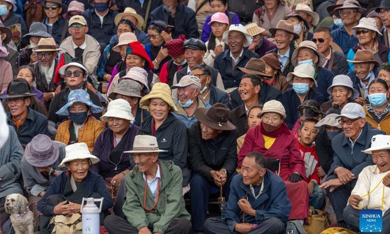 People watch Tibetan opera performances in Lhasa, southwest China's Xizang Autonomous Region, Aug. 24, 2025. Tibetan opera performances are staged here from Aug. 23 to 27 in celebration of the traditional Shoton Festival, or Yogurt Festival, and the autonomous region's 60th founding anniversary. (Xinhua)