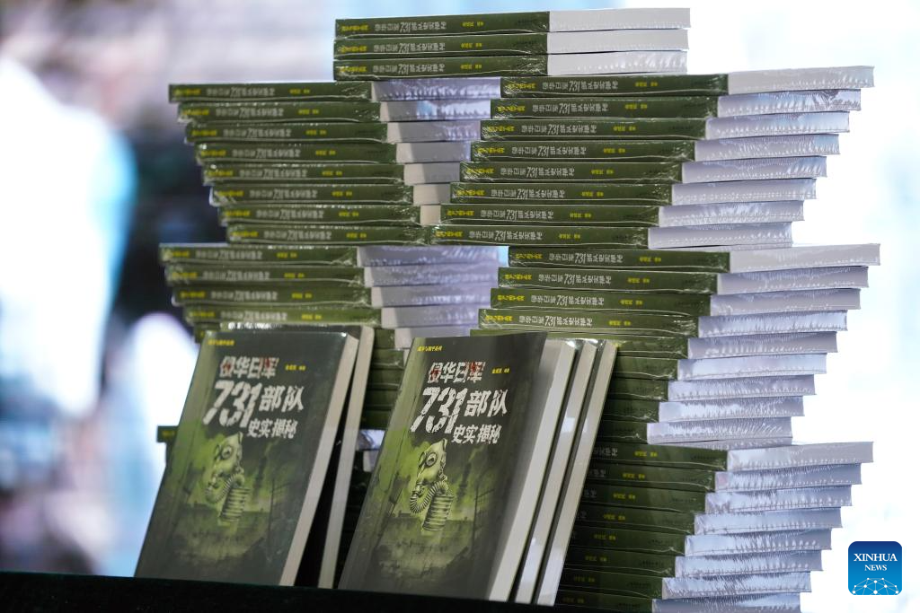 This photo shows books on the crimes of Unit 731 during a launch ceremony held at the Exhibition Hall of Evidence of Crimes Committed by Unit 731 of the Japanese Imperial Army, in Harbin, northeast China's Heilongjiang Province, Sept. 17, 2025. The two books, with the latest research covering transnational verification, oral histories, and multilingual archives, record the crimes of Unit 731 and expose Japan's wartime atrocities. (Xinhua/Wang Song)