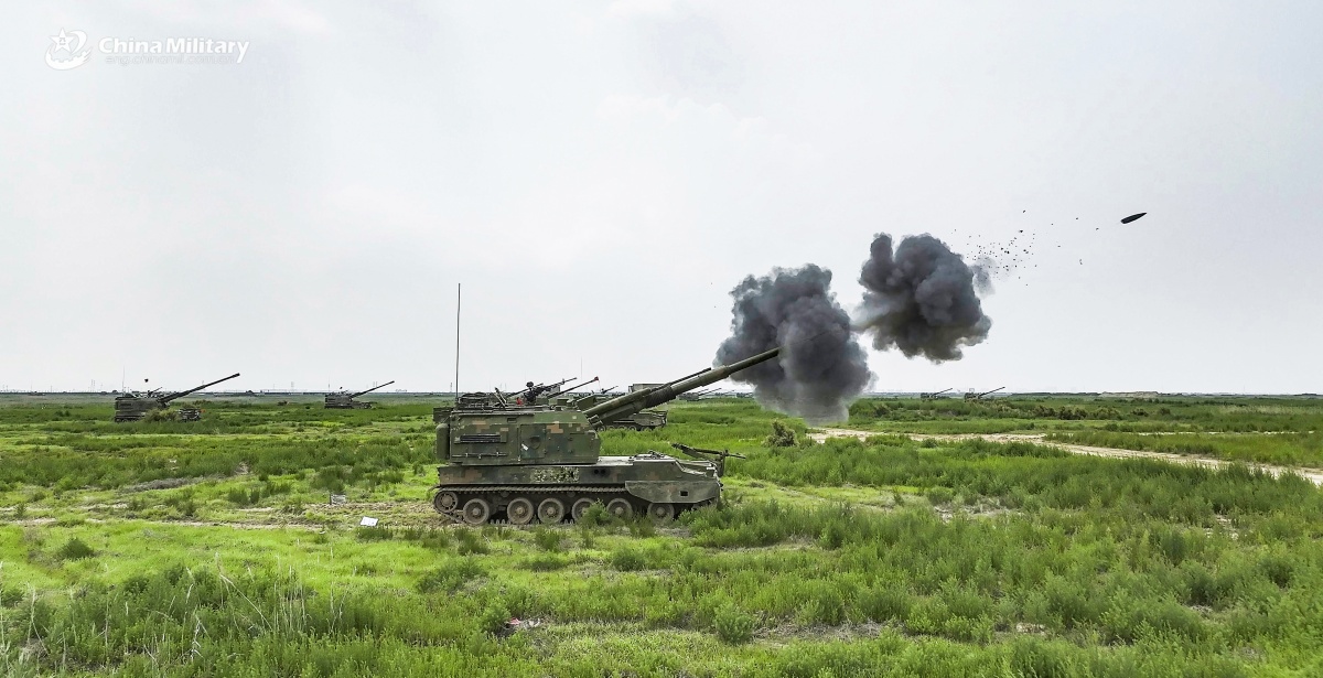 A PLZ-05 155mm tracked self-propelled howitzer attached to a brigade under the Chinese PLA 82nd Group Army opens fire during a live-fire shooting training exercise in late September, 2025. (eng.chinamil.com.cn/Photo by Wang Zhengjie)