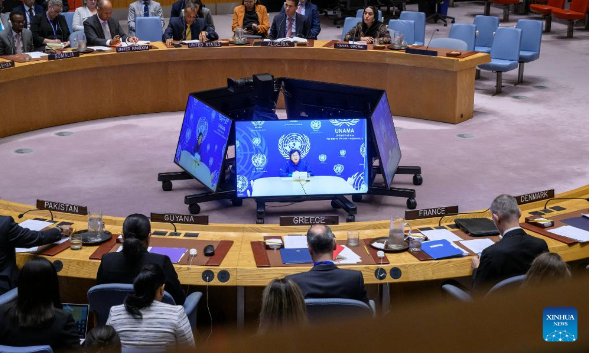 Roza Otunbayeva, the UN secretary-general's special representative for Afghanistan (on screens) speaks via a video link at a Security Council meeting at the UN headquarters in New York, Sept. 17, 2025. Otunbayeva on Wednesday called for the international community's continued engagement with the war-torn country. (Loey Felipe/UN Photo/Handout via Xinhua)