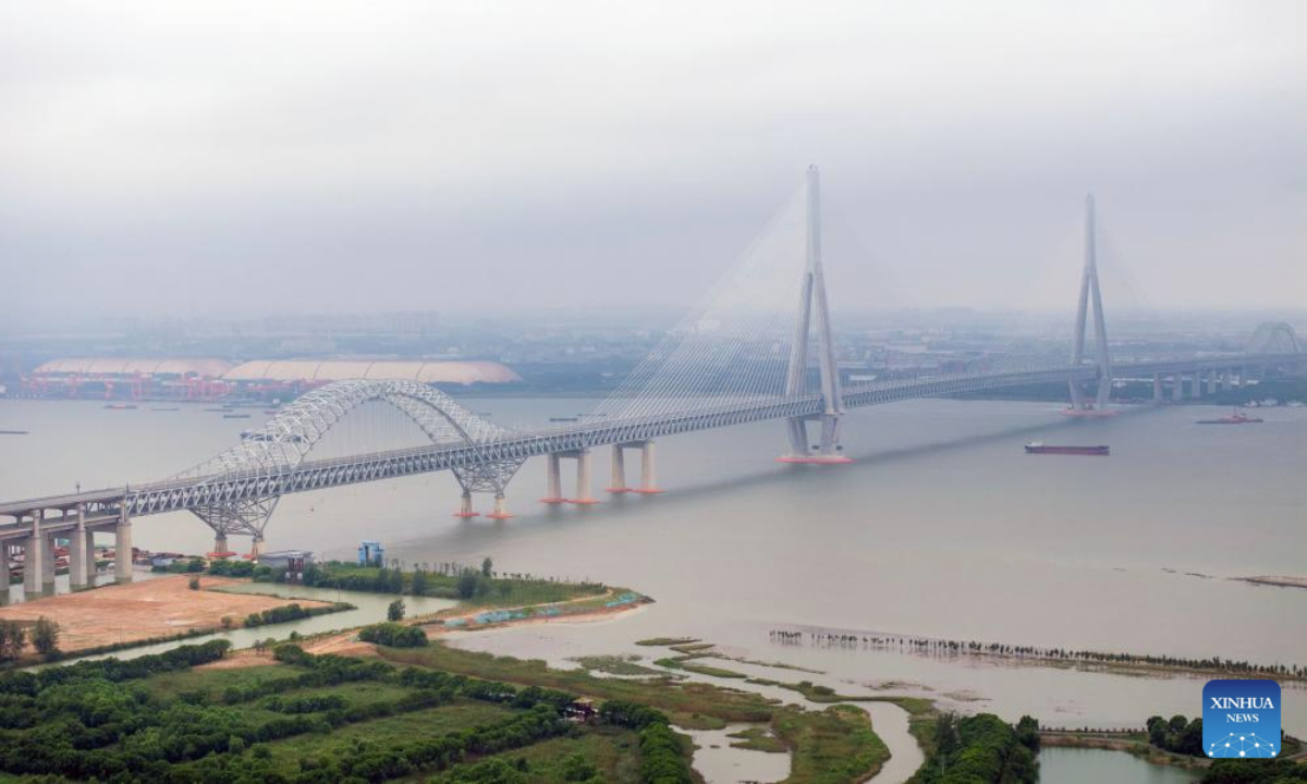 An aerial drone photo taken on Sept. 9, 2025 shows a view of the Changtai Yangtze River Bridge, seen from Taixing City of Taizhou, east China's Jiangsu Province. The Changtai (Changzhou-Taizhou) Yangtze River Bridge, an artery of communications that integrates highways, intercity railways, and local roads, started operation on Tuesday.

Spanning 10.03 kilometers, the bridge slashes travel time between Changzhou and Taizhou, both in Jiangsu Province, from 80 minutes to 20 minutes, boosting development for the Yangtze economic belt and integration of the Yangtze River delta region. (Photo by Tang Dehong/Xinhua)